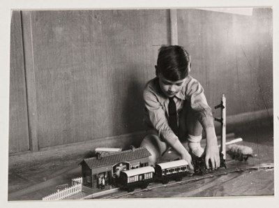 Boy-playing-with-a-train-set